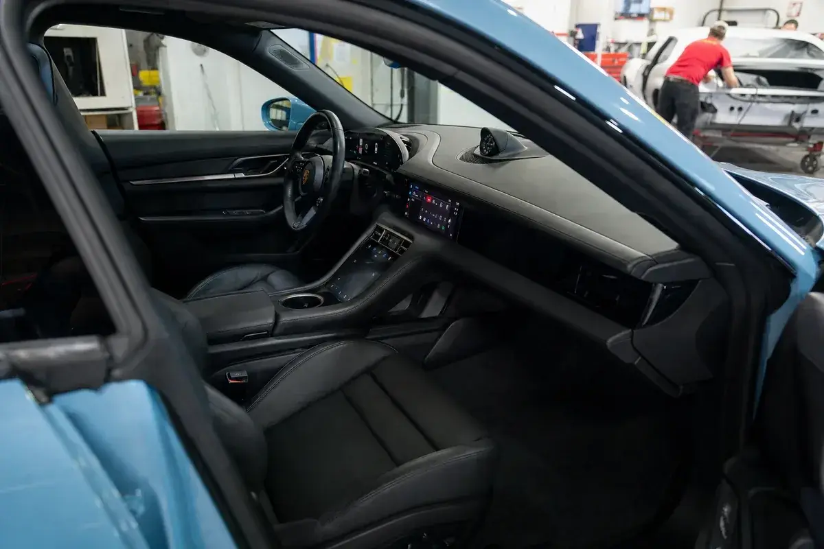 A freshly detailed, spotless car interior at Podium Body Works in Round Rock, Texas